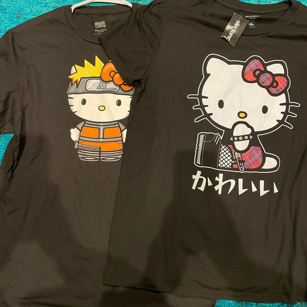 2 brand new hello kitty t shirts one side medium -the orange one is a Large